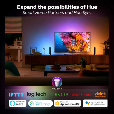 Living room with A19 smart bulb showcasing vibrant colors on a TV and walls, highlighting compatibility with various smart home systems.