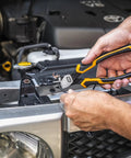 Pitbull Cushion Grip Pliers Set With Foam Storage Tray, K9 Jaw Grip being used to cut wire in automotive repair