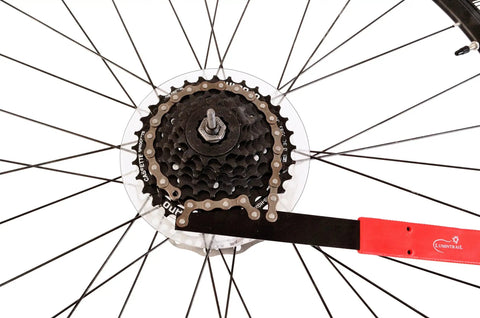 Chain Whip For Bike Cassette Removal Tool Sprocket Remover Lockring Removal With Comfortable Grip in use on bike cassette