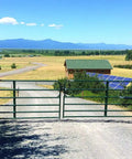 Heavy Duty Solar Dual Automatic Gate Opener Kit For Swing Gates Up To 20 Feet With 10 Watt Solar Panel Included DIY Residential Driveway Gate Opener For Gates Up To 900 Pounds And 12 Feet Long Max 24 Feet Opening Plug And Play at countryside driveway with solar panels visible