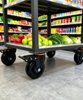 Built Tough 4 Inch Industrial Swivel Caster Wheels With Slam Lock Brakes Set Of 4 Roll Easy Flat Casters on a cart with vegetables.