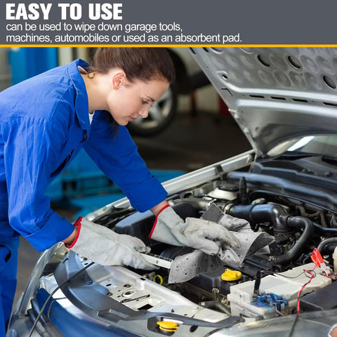 Heavy Duty Oil Absorbent Pads 100 Pack 13 X 10 Inch Meltblown Polypropylene being used to clean a car engine.