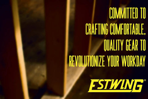 Blurry image of wooden beams with text: 'Committed to crafting comfortable, quality gear to revolutionize your workday. Estwing logo'