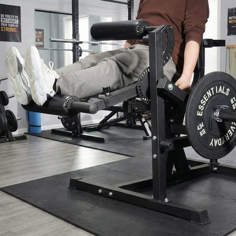 Adjustable Leg Extension And Curl Machine For Home Gym Space Saving All In One Strength Training Gear in use