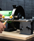 Bench Grinder Mounting Kit For Tormek Sharpening Jigs And Universal Arm With Height And Depth Adjustable Support For Sharpening System On Your Grinder Must Have Mounting And Stable Locking For Quick Setup On Any Bench Grinder in use, illustrating practical application with woodworking tools.