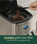 Adding coffee grounds to 12 Cup Programmable Coffee Maker With PerfecTemp Thermal Carafe, stainless steel finish, close-up view