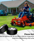 Woman on mower with Flat Free 11x4-5 Lawn Mower Front Tires for Zero Turn Mowers, solid tire 2 pack, gray, 350 pound capacity