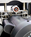 Workhorse Cabinet Tablesaw Boasting A Beefy 7.5Hp Motor Integrated Dust Collection Gear And Factory Fresh Blade close-up of the motor and dust collection system.