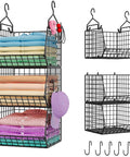 Dead Simple Hanging Closet Organizer With Expansive Tiered Wire Baskets Saves Serious Space In Your Laundry Room. Black steel frame with colorful folded clothes.