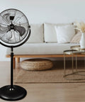 Industrial 20 Inch Drum Fan with metal pedestal in living room, 3 speed motor, 5 stainless blades, 360 degree tilting, adjustable height