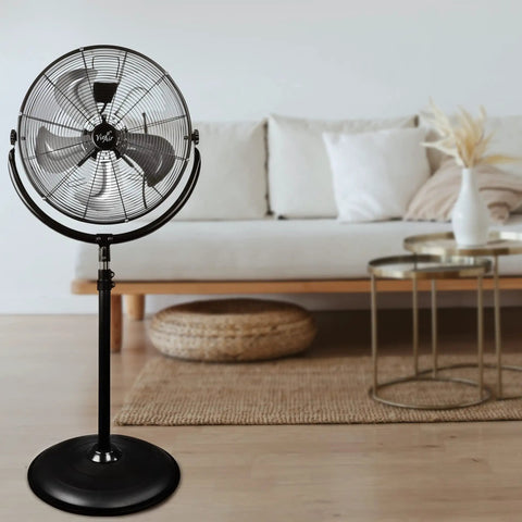 Industrial 20 Inch Drum Fan with metal pedestal in living room, 3 speed motor, 5 stainless blades, 360 degree tilting, adjustable height