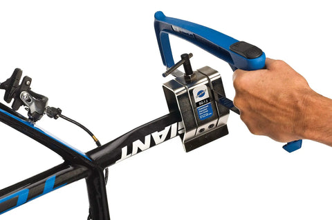 Hands using Oversized Adjustable Saw Guide For Bikes SG 7.2 Built Beefy For Aero Shaped Seat Masts And Posts Up To 3.5 Inches Deep