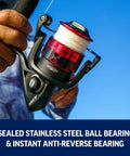 Close-up of Fierce IV Spinning Reel And Fishing Rod Combo For Saltwater Angling with full metal body, held by an angler.