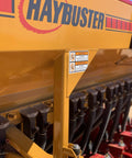 Close-up of a planter with Two Pack Grain And Drill Seed Tube For Most Drills, 17 Inches Long But Stretch To 24 Inches visible.