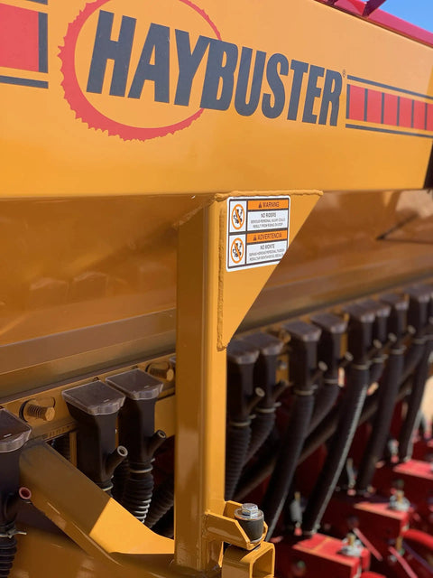 Close-up of a planter with Two Pack Grain And Drill Seed Tube For Most Drills, 17 Inches Long But Stretch To 24 Inches visible.