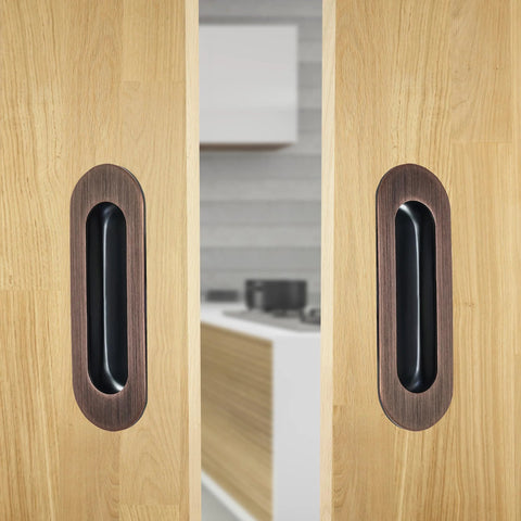 6 Inch Recessed Flush Pull Door Handle For Sliding And Pocket Closet Doors, Oval Pocket Finger Pull shown installed on wooden doors