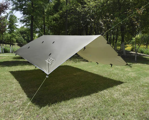 Rainfly Tarp Hammock Shelter Ultralight Waterproof Canopy set up in a grassy area with forest background, OD green color