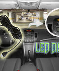 Car dashboard showing Four Sensor Car Reverse Parking Radar System with LED display in action.