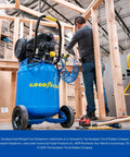 10 Gallon Oil Free Portable Vertical Electric Air Compressor providing no sweat 150 PSI maximum output in a workshop setting.
