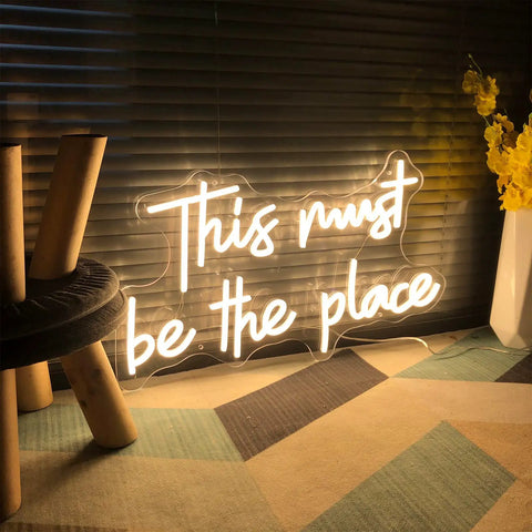 Large LED Neon Sign This Must Be The Place Wall Decor with warm white glow, adjustable brightness, 21.65 x 12.4 inches, for home decor.