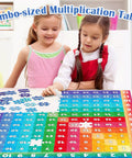 Children playing with Multiplication Chart Puzzle 21x21 Inch Math Game Table for Kids Ages 7 and Up, Kid-Friendly Learning Toy.