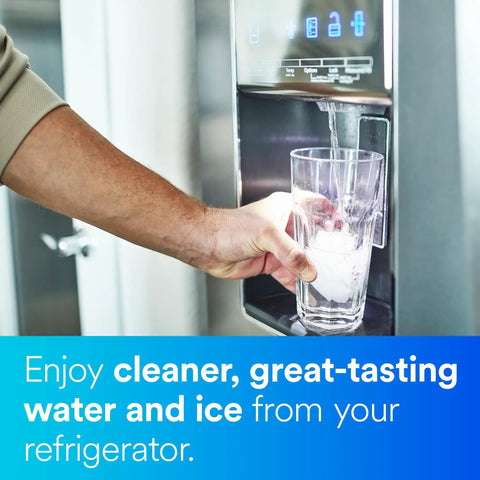 Person using refrigerator with Inline Water Filter For Refrigerators Ice Makers And Drinking Fountains That Cuts Chlorine Taste