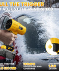 Person using Cordless 20V Max Leaf Blower With 40000 RPM Brushless Motor 180 MPH to remove snow from car windshield