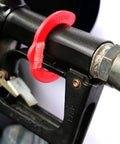 Hands Free Gas Vise Universal Size Nozzle Gripper That Lets You Fill Up Without the Squeeze and Multitask at the Pump attached to a fuel nozzle