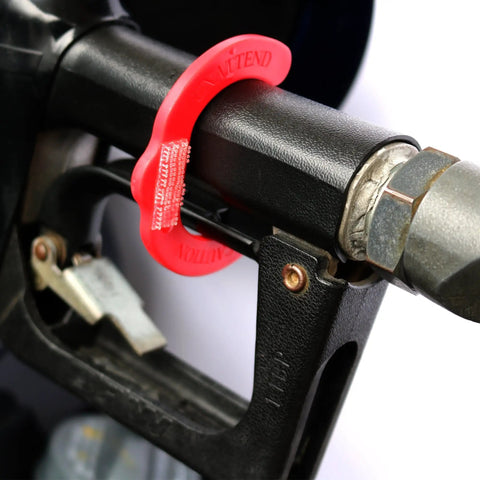 Hands Free Gas Vise Universal Size Nozzle Gripper That Lets You Fill Up Without the Squeeze and Multitask at the Pump attached to a fuel nozzle