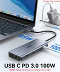 Triple Monitor USB C Docking Station 13-In-1 Hub with laptops connected showing power input and output.