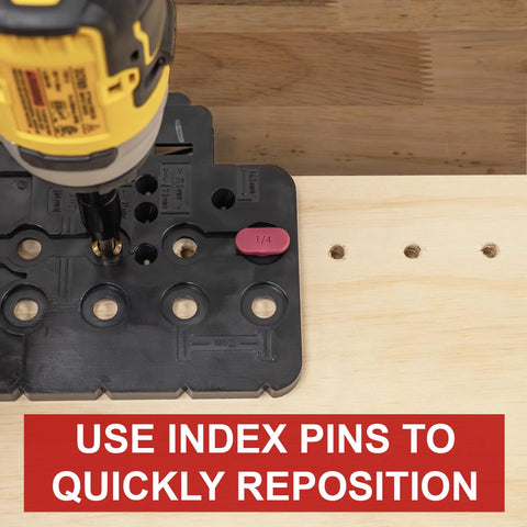 Milescraft CabinetMate shelf-pin drilling jig, black base with multiple holes and pink 1/4 insert, drill in use.