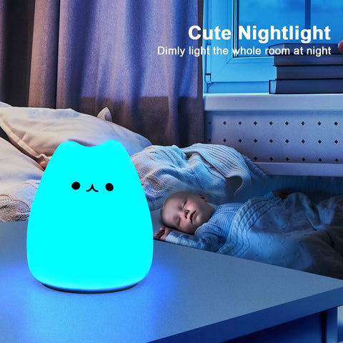 LED Cat Night Light For Kids Battery Powered Silicone Cat Nursery Night Light With 2 Soft Glow Modes on bedside table