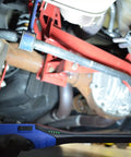 Mechanic using Beast Mode Slim LED Work Light With 650 Lumen COB Main Beam And 120 Lumen Top Flashlight under car chassis