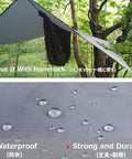 Rugged All Weather Waterproof Tent Tarp Hexagon Rain Fly With Hammock Ground Cloth And Sunshade Mat for Camping Picnics Hiking Beach Survival Gear Gray Large shown in use as a hammock shelter in forest setting.