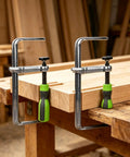 Rock Solid Kickass Hold Down Clamps For Woodworking Track Saws And T Track Jigs Precision Dovetail shop fixture on wooden tabletop.