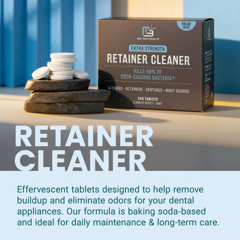 Box and tablets of Extra Strength Retainer And Denture Cleaning Tablets 8 Month Supply Removes Odor, Stains, Plaque visible on table.