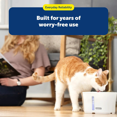 Cat drinking from a Viva Pet Fountain Replacement Pump Ultra Quiet Hydration Booster Backup Pump shown in use