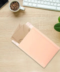 Heavy Duty Bubble Mailers 13x18 And 4 Inch Foam Padding on desk with coffee cup