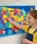 Child interacting with USA Map With Reusable Stickers Wall Chart For Kids, 100 Plus Jelly Stickers, Fun Geography Games And Learning Toy