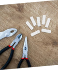 Professional Grade Furniture Hidden Connectors For Shelf Assembly Fasteners And Cabinet Panel Joint Hardware Adjustable Concealed Locking Pins for wood work and tools on a wooden surface.