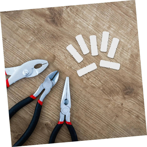 Professional Grade Furniture Hidden Connectors For Shelf Assembly Fasteners And Cabinet Panel Joint Hardware Adjustable Concealed Locking Pins for wood work and tools on a wooden surface.