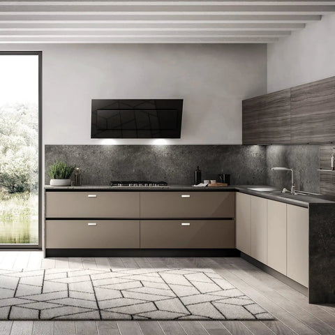 Modern kitchen with flat-panel cabinets, wall-mounted TV, and view of outside greenery through glass door.