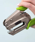 Hand holding Crop-A-Dile Power Punch For One Quarter Inch Holes Scrapbooking Tool That Delivers Clean Punches Through Paper Leather Fabric