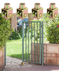 4 Pack 2.5 Inch Sliding Gate Wheels With 360 Degree Rotational Stem And V Groove Caster shown on a metal garden gate