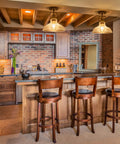 Cozy kitchen with farmhouse flush mount ceiling light with aged black metal frame and seeded glass shade, 3 wooden bar stools