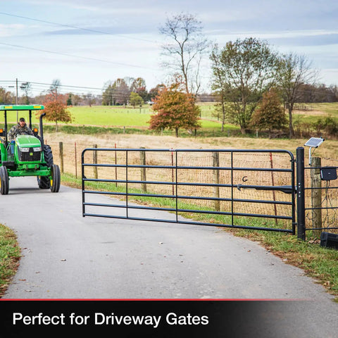 Game Changing Solar Automatic Gate Opener Designed For Heavy Duty Outdoor Chain Link And Wood Gates Up To Sixteen Feet With Slick Remote Controller Full System Kit installed on a driveway gate.