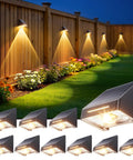 Make Your Outdoors Slay With These Big Time Solar Fence Lights 10 Pack Waterproof LED Lighting Featuring 10 Modes And 9 Colors Ideal For Deck Railing Patio Walls And Garden Steps Right Now, displayed at night on a wooden fence.