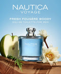 Absolute Fire Mens Eau De Toilette Spray Packing Crisp Fresh Apple Top Notes With Soothing Ocean Lotus And Deep Earthy Woody Foundation Long Lasting Cologne Game Changer Dope Gift For Him 3.3 Fl Oz with green apple and lotus flowers on a wooden surface.