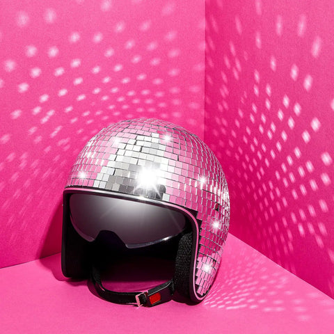 Disco Ball Helmet with retractable visor reflecting light on pink background for DJ club stage bar costume accessories silver shine.