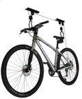 Bike Hoist For Garage Storage Ceiling Lift With 100 Lb Capacity Easy Install Rubber Coated Hooks For Scratch Free Parking And Ladder Style Lift That Lets You Hang Bikes Neatly And Safely In Your Garage lifting a bicycle.